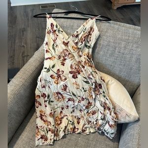pretty floral dress, but of a ruffle on the side